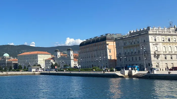 Trieste skyline with historic waterfront and hills in the background